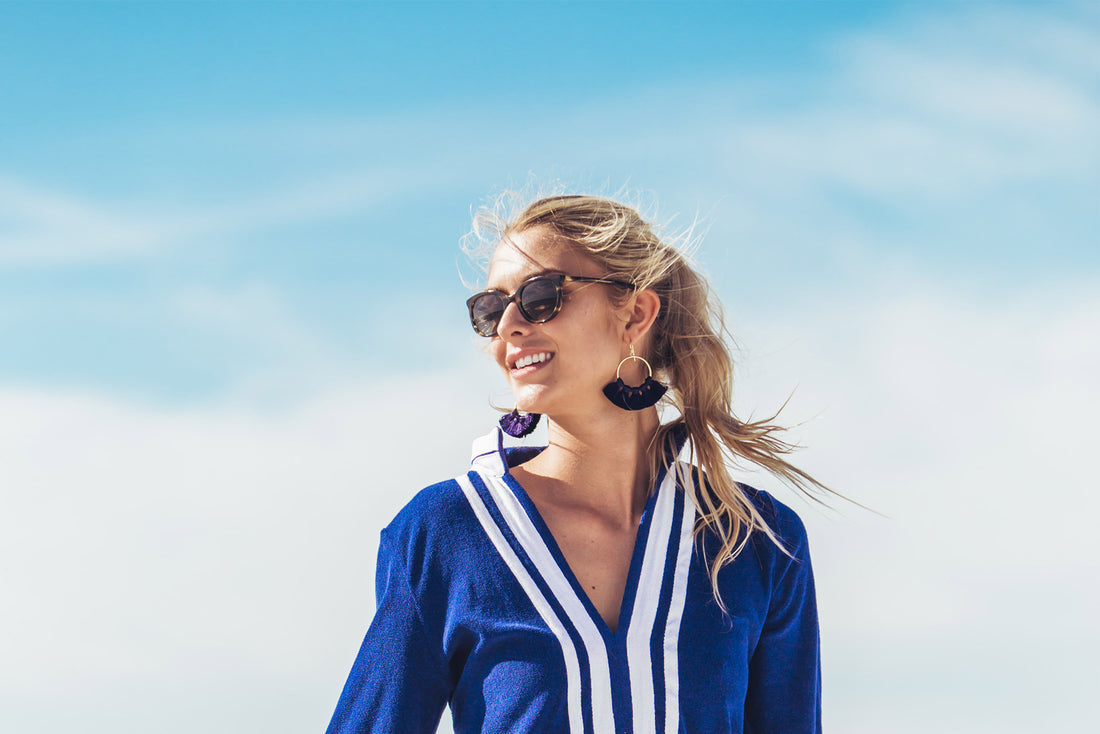 Woman wearing sunglasses and Cabana Life Navy Sleeveless Terry Tunic | UPF 50+