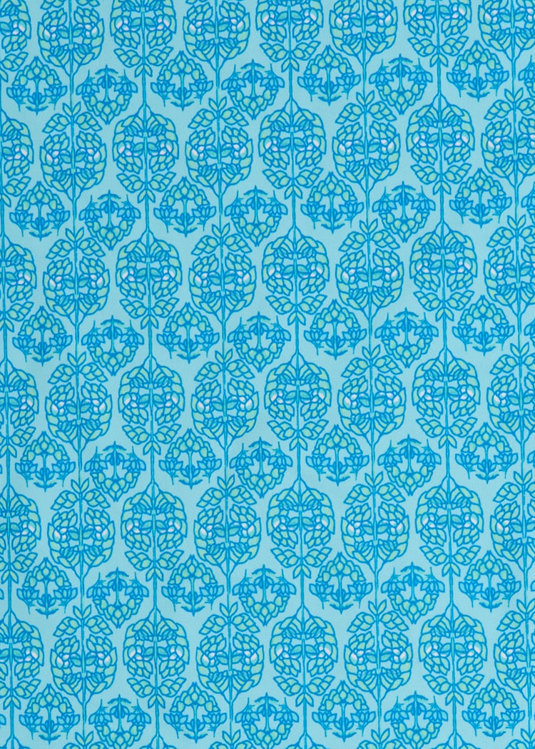 A close up of the UPF 50+ blue printed woven fabric on the Cabana Life Rosebay Relaxed Dress.