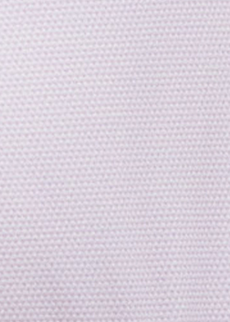 Close-up of a textured white fabric pattern