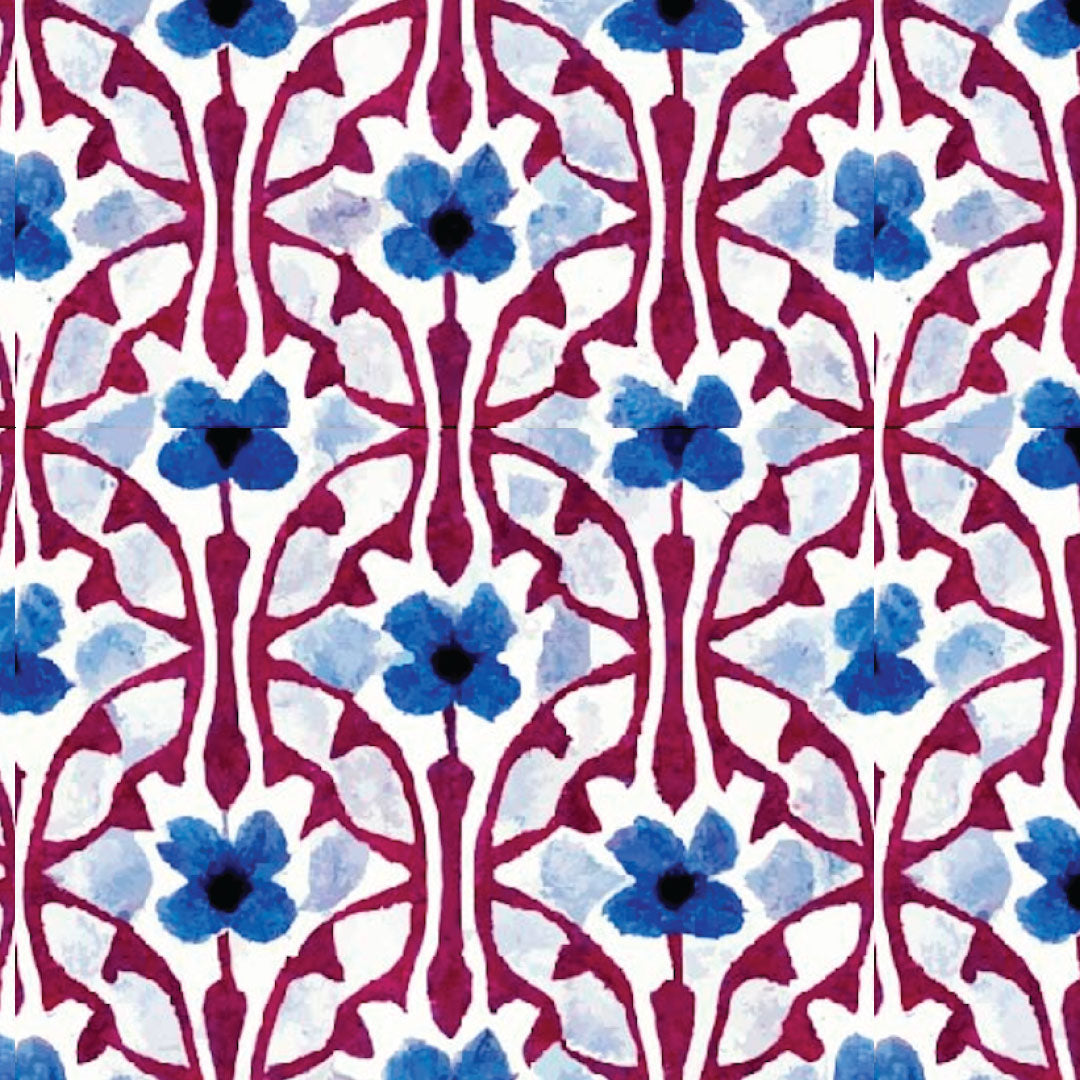 A close up of the sun protective Concord pattern with blue flowers and red and white abstract shapes. 
