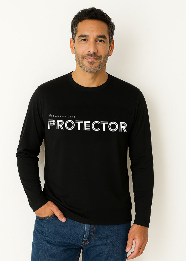 Brunette man in a studio wearing our sun safe Black Unisex Long Sleeve Protector Performance Shirt.