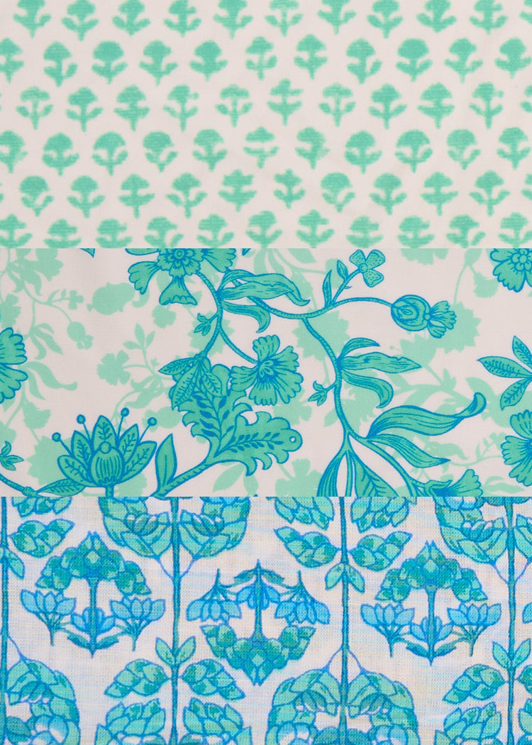 A mix of green and blue floral prints from Cabana Life's Rosebay Collection of sun protective fabrics.