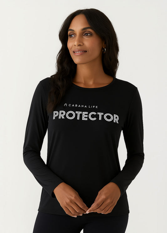 Brunette woman in a studio wearing our sun safe Black Unisex Long Sleeve Protector Performance Shirt.