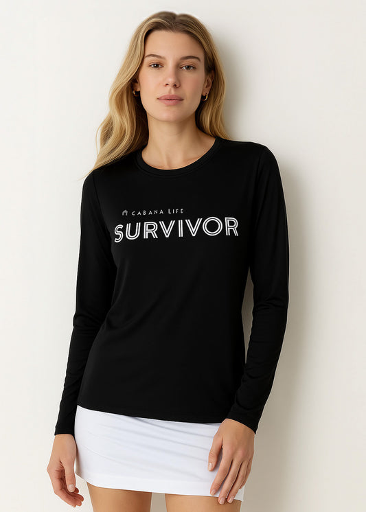 Blonde woman in a studio wearing our sun safe Black Unisex Long Sleeve Survivor Performance Shirt.