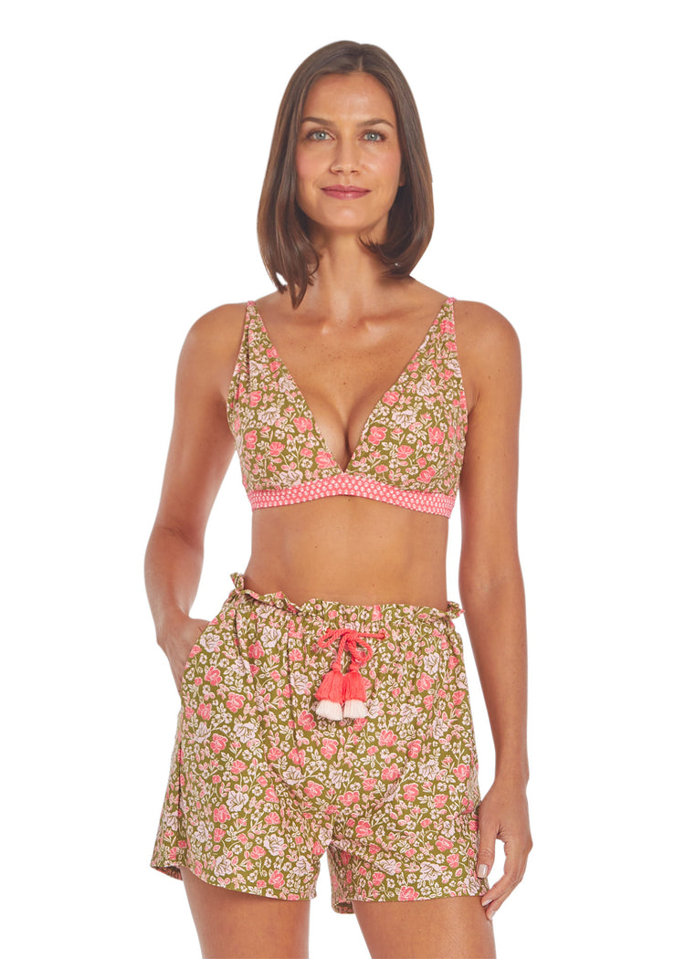 Woman wearing Jetties Beach Reversible Triangle Bikini Top & Jetties Beach Paperbag Waist Tassel Short