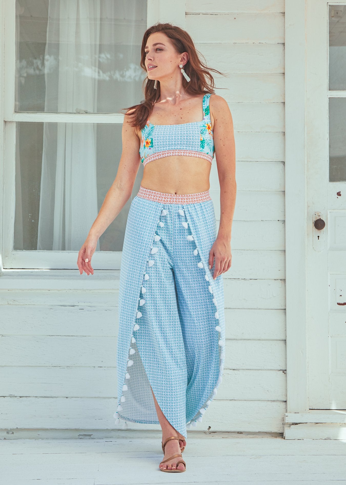 Woman wearing Cabana Life Bikini Top and Cayman Tassel Palazzo Beach Pants