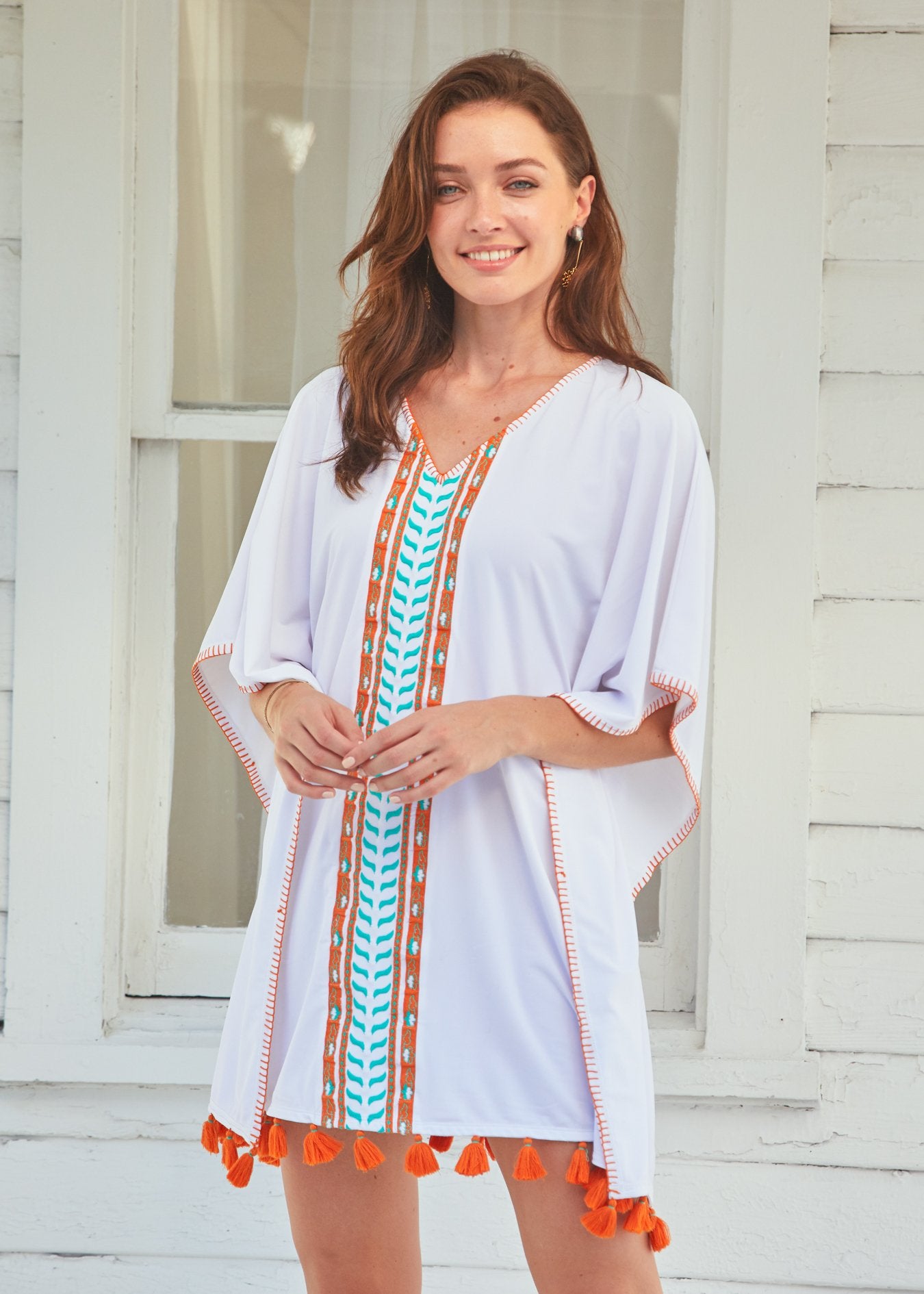 Woman wearing Cabana Life Cayman embroidered cover up