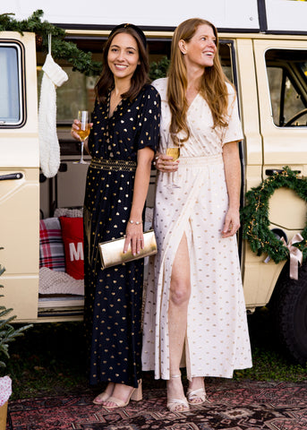 Woman wearing Black Metallic Embroidered Maxi Dress and woman wearing Ivory Metallic Embroidered Maxi Dress