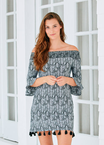 Woman wearing Sanibel Off the Shoulder Dress.