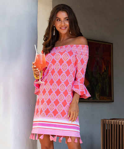Woman wearing Coral Geo Off The Shoulder Dress