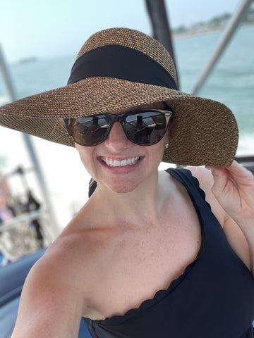 Kaitlyn F. in sun hat and sunglasses