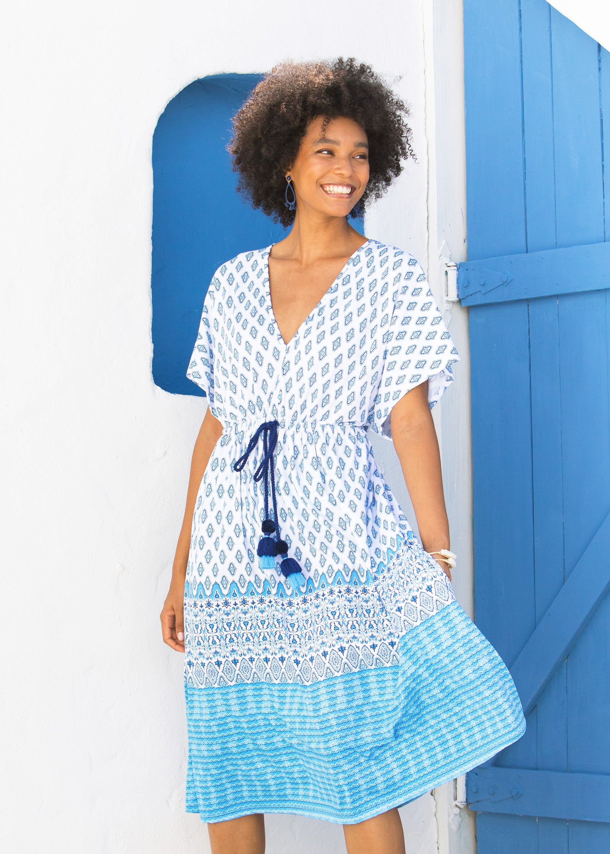 Woman wearing Seascape UPF 50+ midi dress