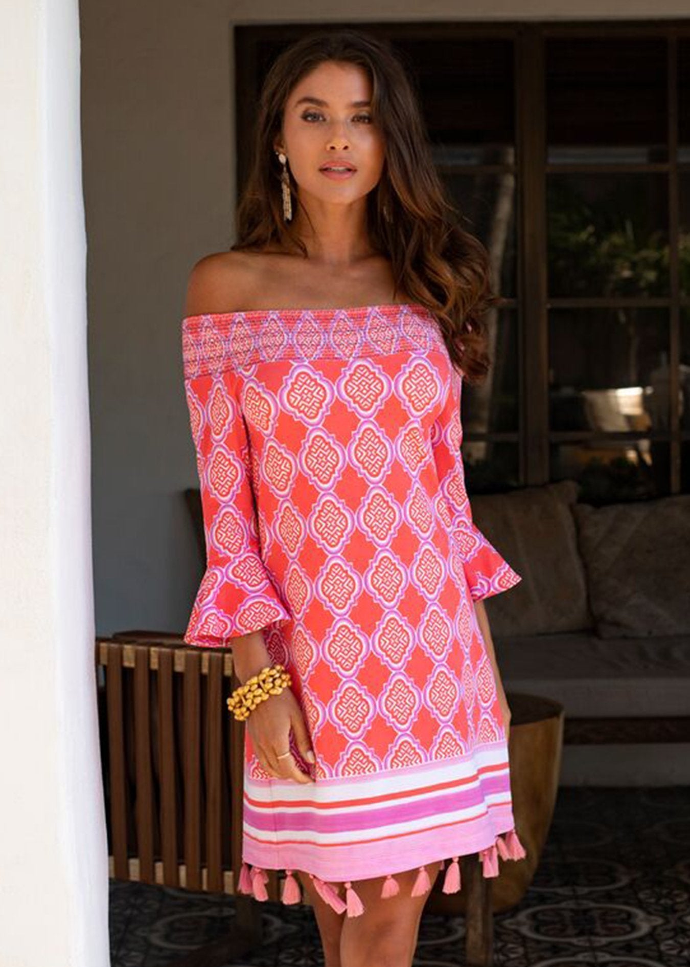Woman wearing Coral Geo Off the Shoulder Dress with UPF 50+