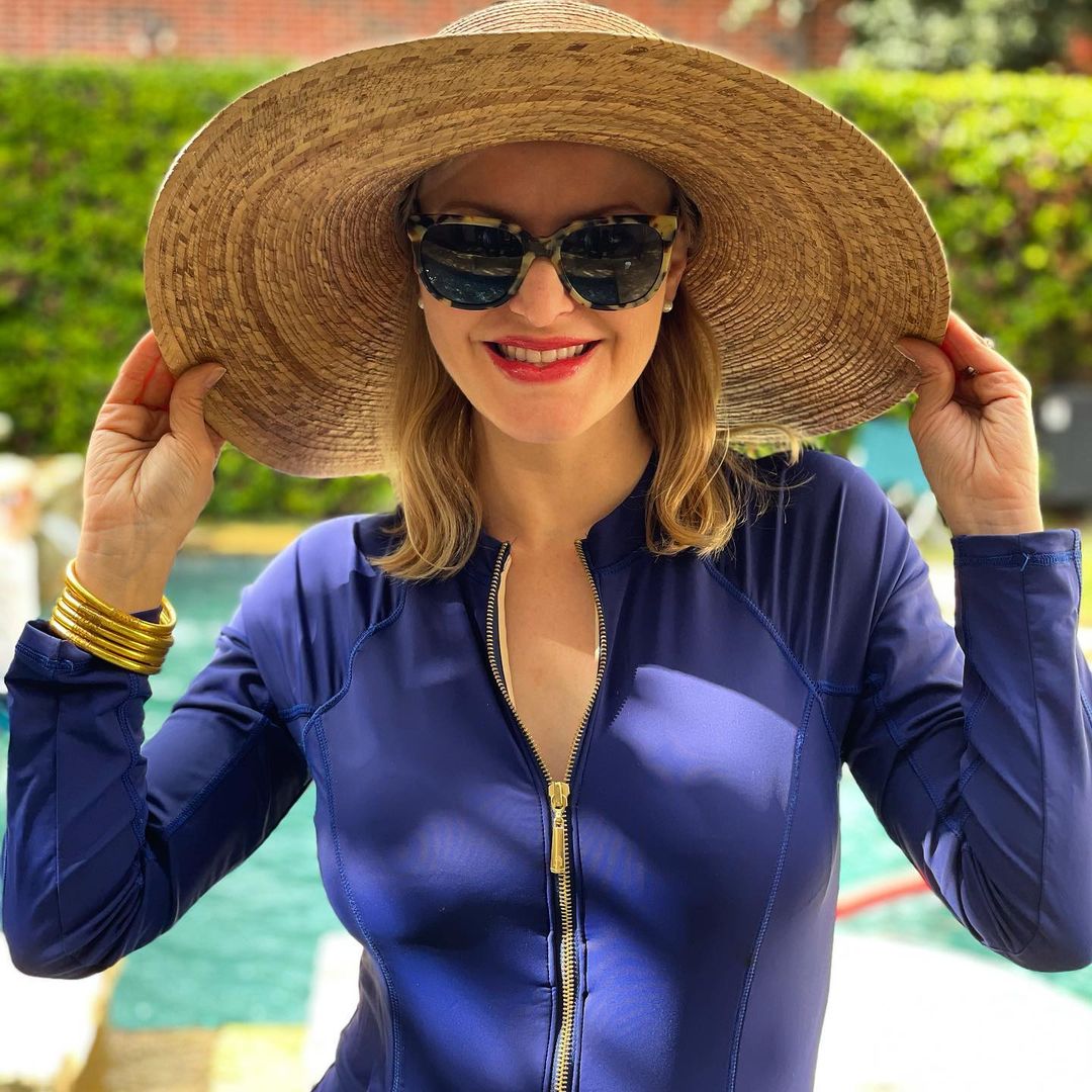 Woman wearing Cabana Life UPF 50+ Navy Unisuit