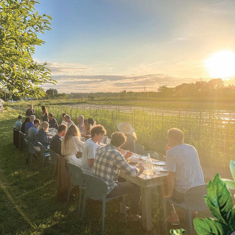 Family around table at Wölffer
